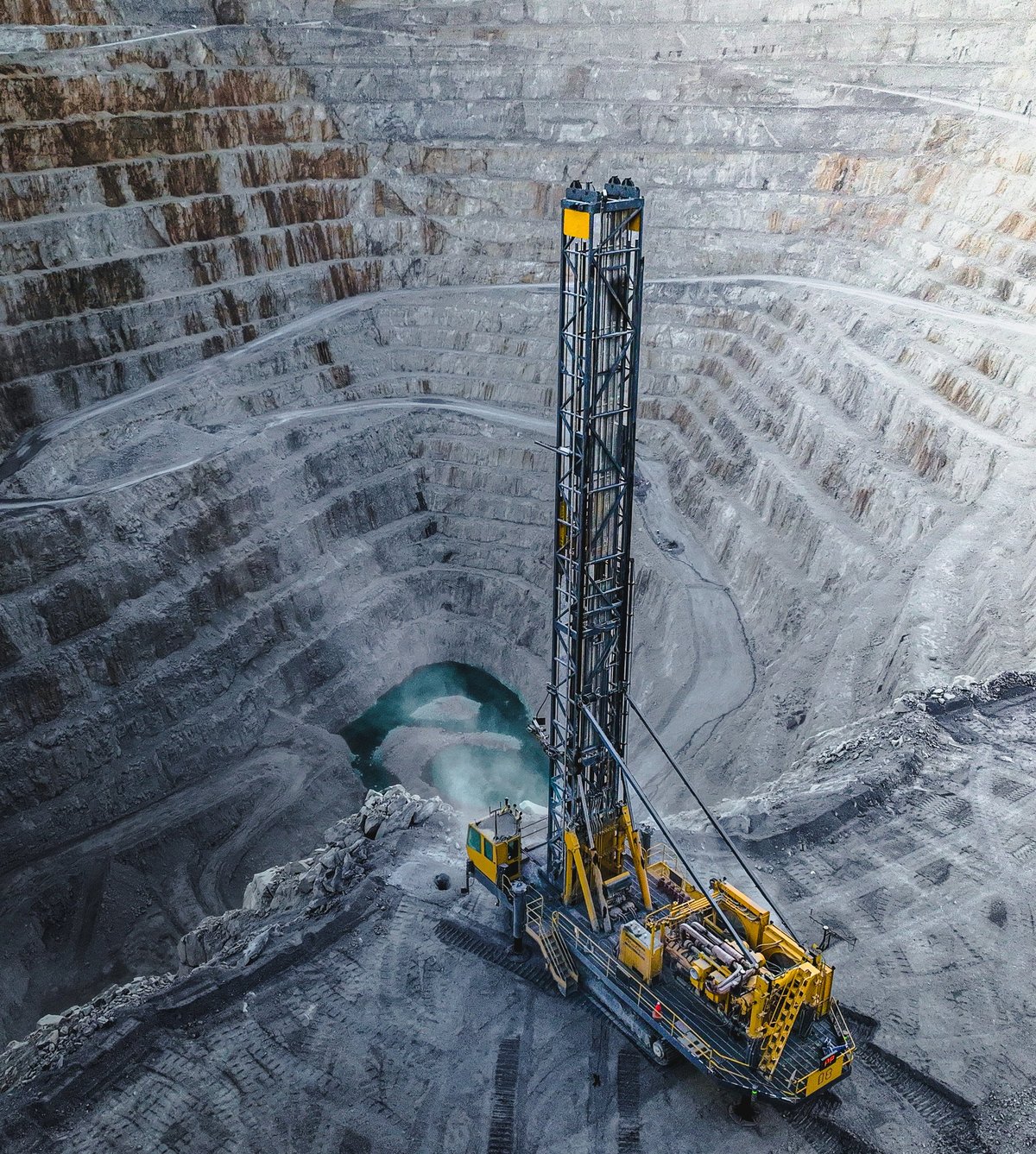 Drilling machine in an open pit mine